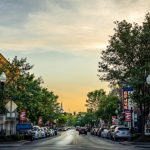Main Street - landscape photography of vehicles parked on side of a street
