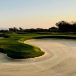 Golf Course - golf field under clear blue sky