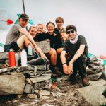 Group Photo - group picture of men and women on hill at daytime