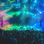 Festival Poster - group of people in front of stage