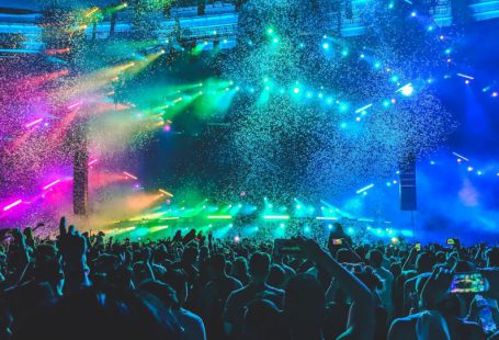 Festival Poster - group of people in front of stage