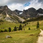 Mountain Path - green grass field near mountain during daytime