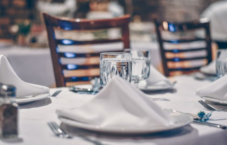 Budget Hotel - clear glass cup on table