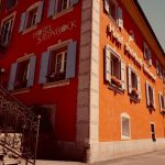 Romantic Hotel - red and white concrete building