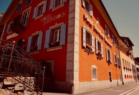 Romantic Hotel - red and white concrete building