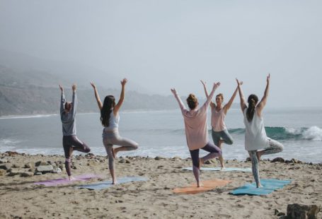 Wellness Retreat - five woman standing on seashore