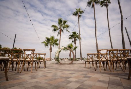 Award Hotel - brown wooden table and chairs on brown concrete floor