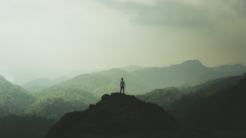 Mountain Top - person standing on mountain