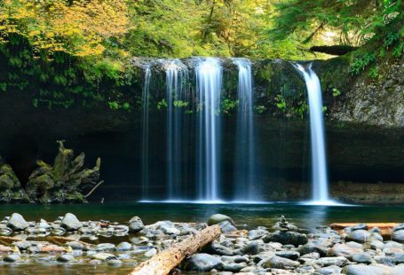 Waterfall - long-exposure photo of lake with waterfall at daytime