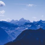 Altitude - mountain rage view under blue sky during daytime
