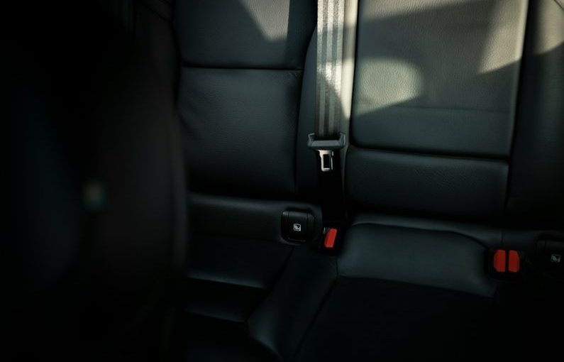 Safety Tips - black leather car seat with seat belt