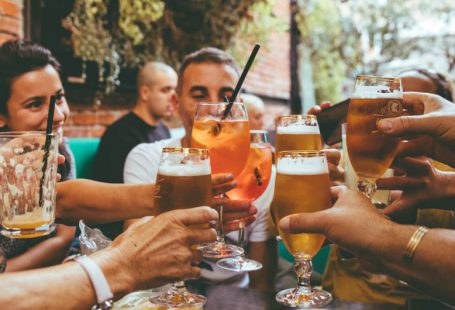 Drinking - people holding drinks during day